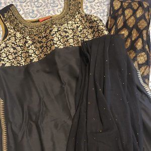 black and golden suit